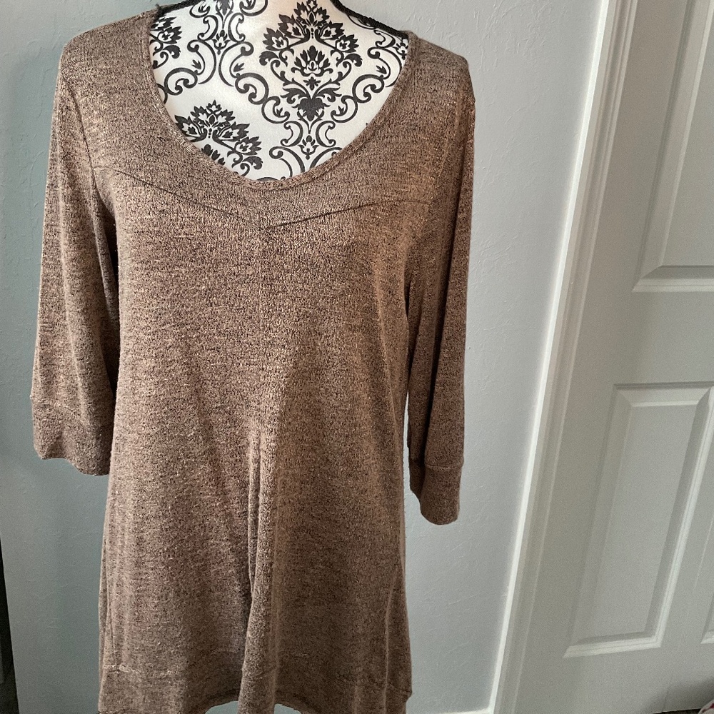 Brown blouse with open back panel.